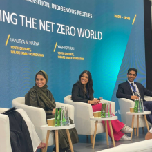 Laalitya speaking on a panel at COP28 in Dubai